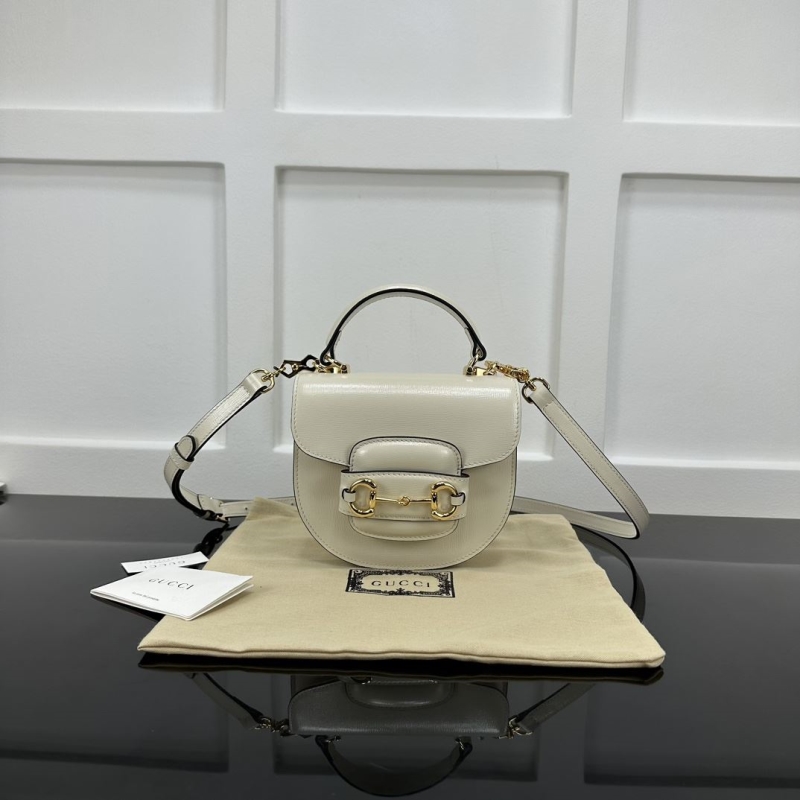 G*u*i top handle bags